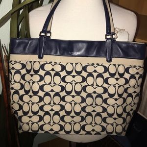 Navy blue and canvas coach tote.